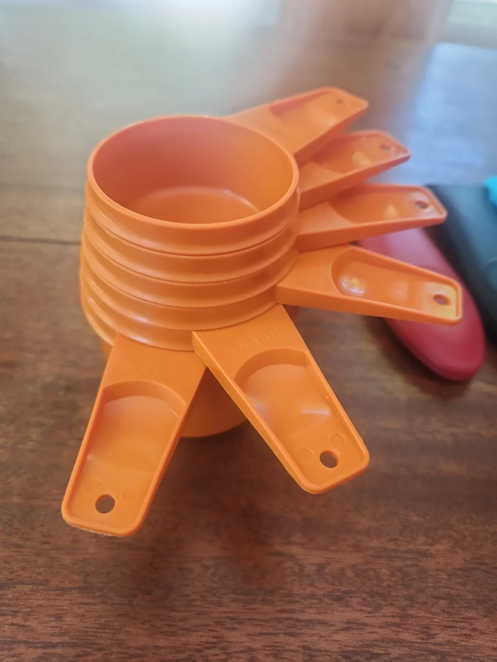 TupperwareOrange Plastic Measuring Cups Plus Other Helpful Kitchen Items